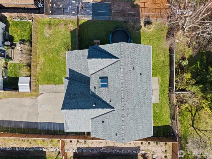 Aerial view of brand new roof and new skylights.