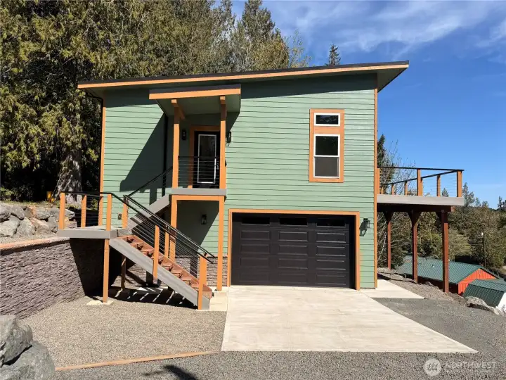 Sage Green & Cedar trim home located at the end of a quiet cup de sac.