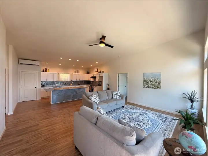 Open floor plan with vaulted ceilings throughout. Open floor plan with vaulted ceilings throughout.