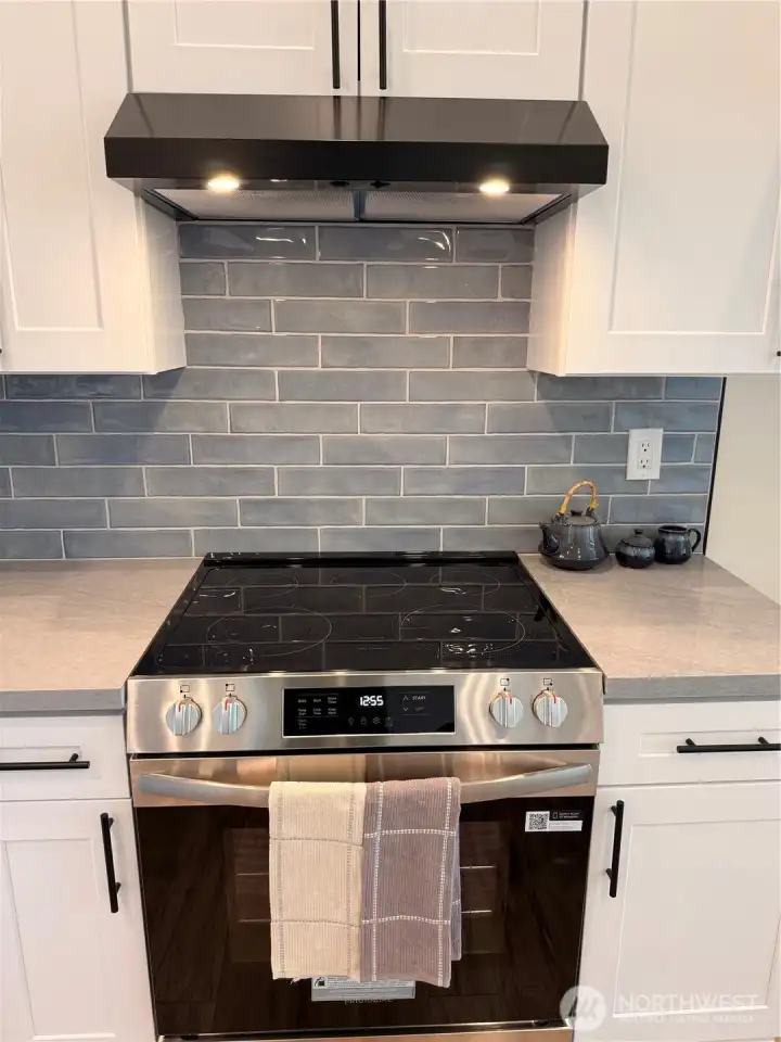 5 burner glass top range/oven.