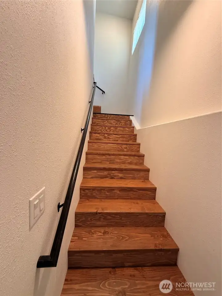Stairs from daylight basement/garage.