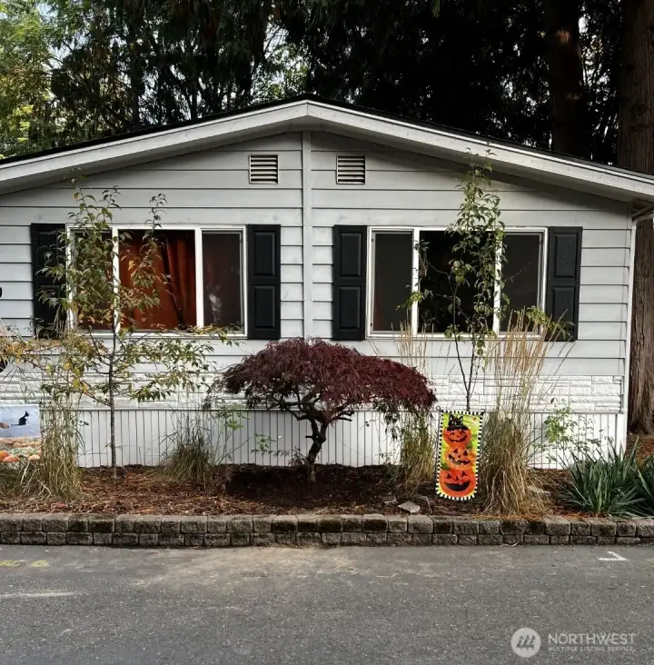 Welcome home with your beautiful red maple in front