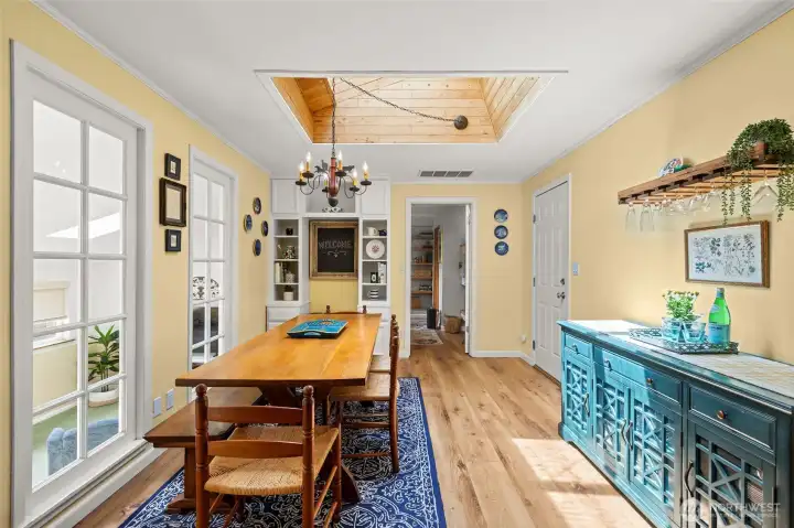 Another view of dining room with built-in bookcase/hutch to match kitchen