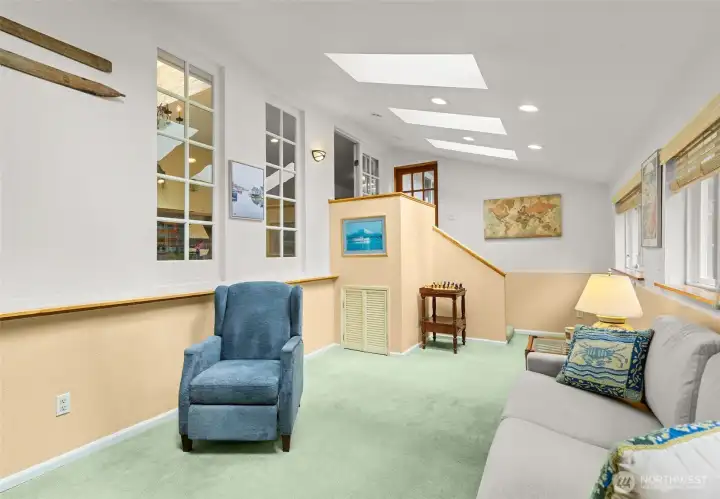 Another view of room and stairs up to dining room/kitchen or into backyard