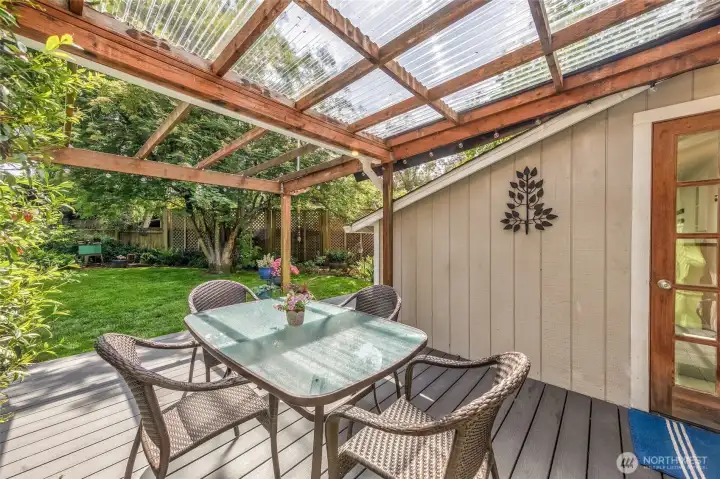Covered dining area for year-around BBQ area