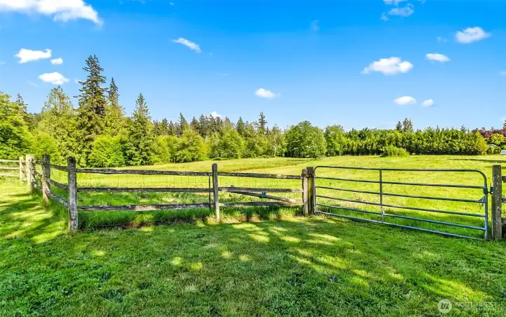 Big open pastures.  Bottom pasture is about 1/2 cleared and 1/2 woods with a gate between the 2.  Both fenced with field fence to hold in the smaller livestock