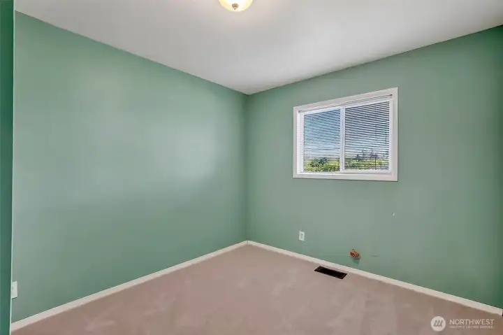 main level bedroom or office with brand new carpet