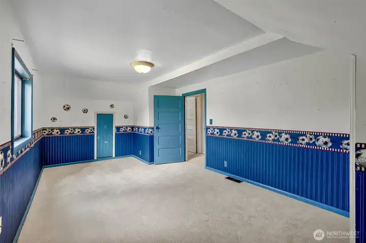 Upstairs bedroom with 2 closets, overlooking the yard and some of the fruit trees