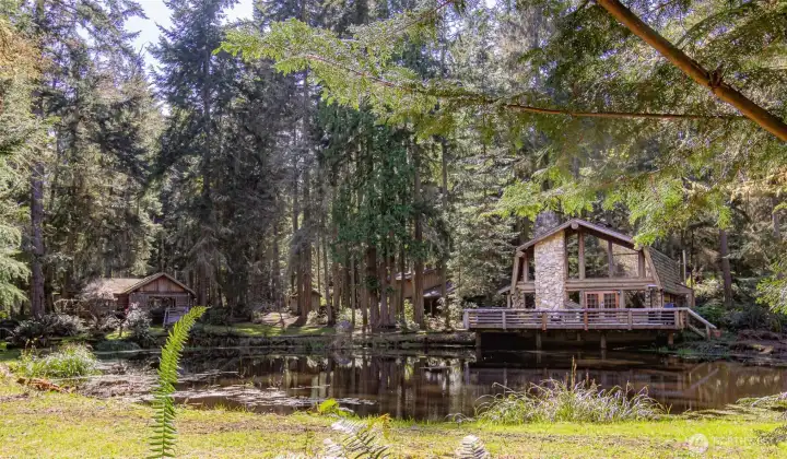 The main lodge overlooks your own private pond!  The Montana cabin is just to the left of the lodge.