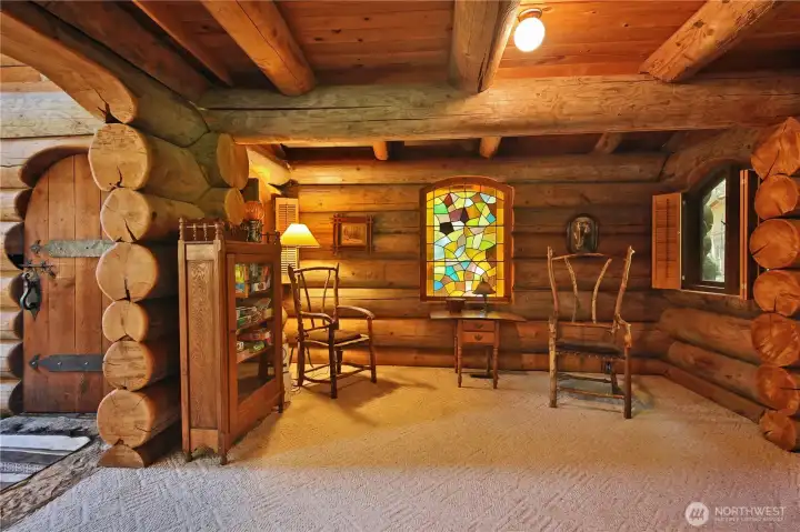This cozy reading area or third bedroom  off the living room is perfect for curling up with a good book!