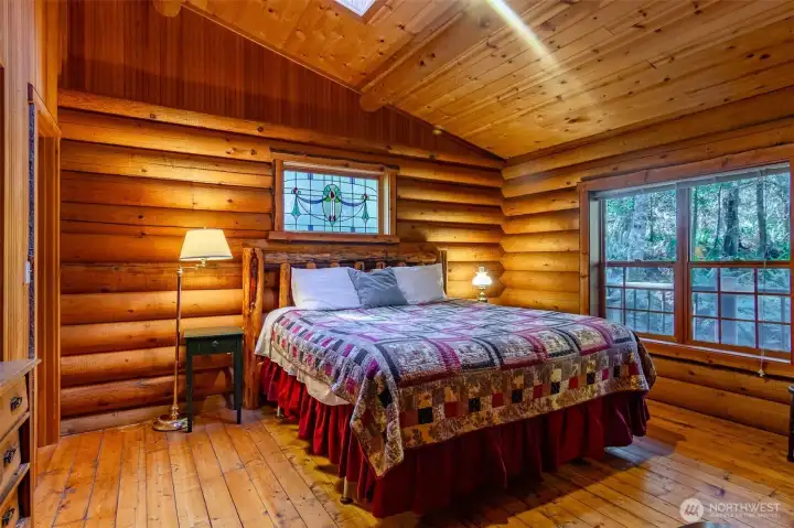 The bedroom is spacious and has a walk in closet.