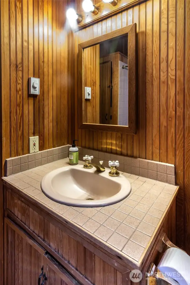 The good sized bathroom has a jetted tub.