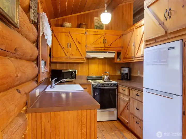 The galley kitchen has loads of counter space for any type of cooking!