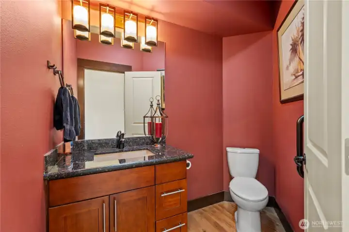 Conveniently located guest bath with tasteful finishes.
