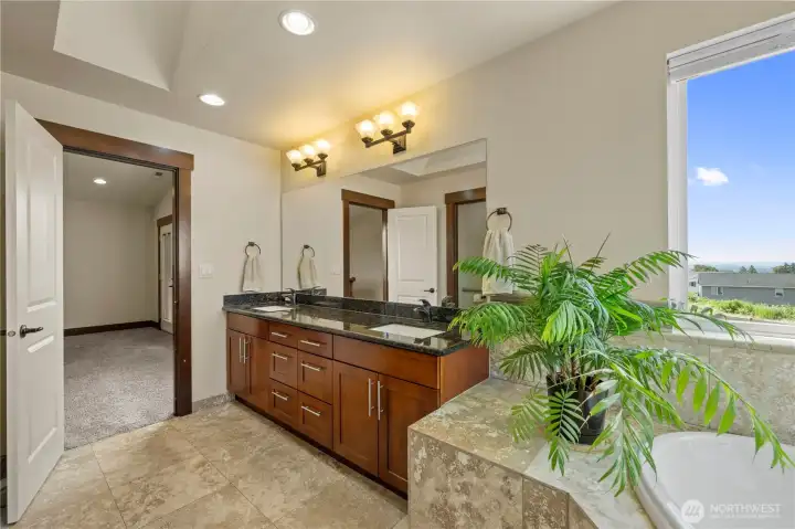 Thoughtfully designed with dual vanities and quality finishes throughout.