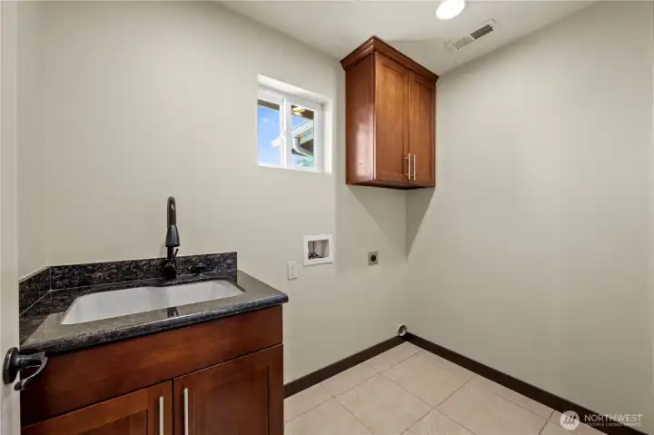 Upstairs laundry adds everyday convenience right where you need it most.