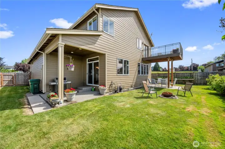 The covered patio creates the perfect setting for year-round outdoor entertaining.