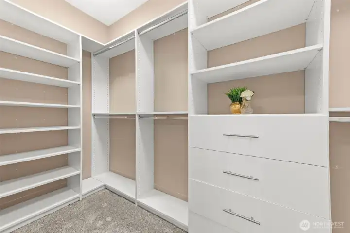 Walk in closet with custo organizers
