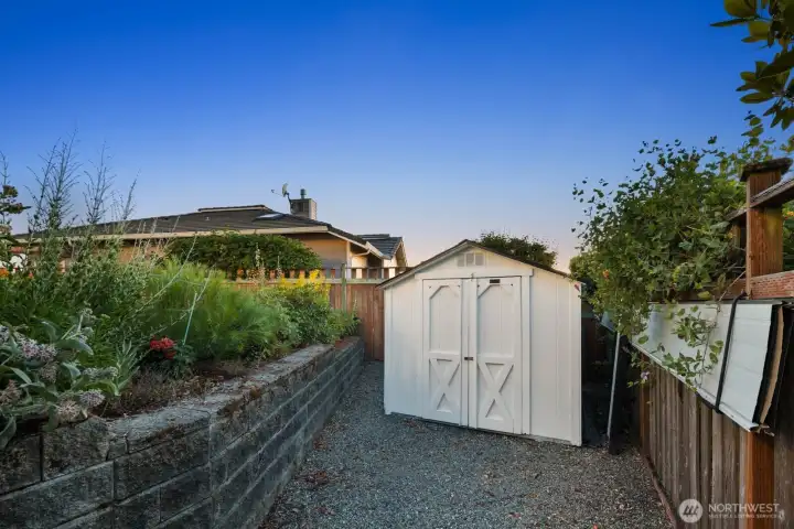 Shed in backyard for storage.