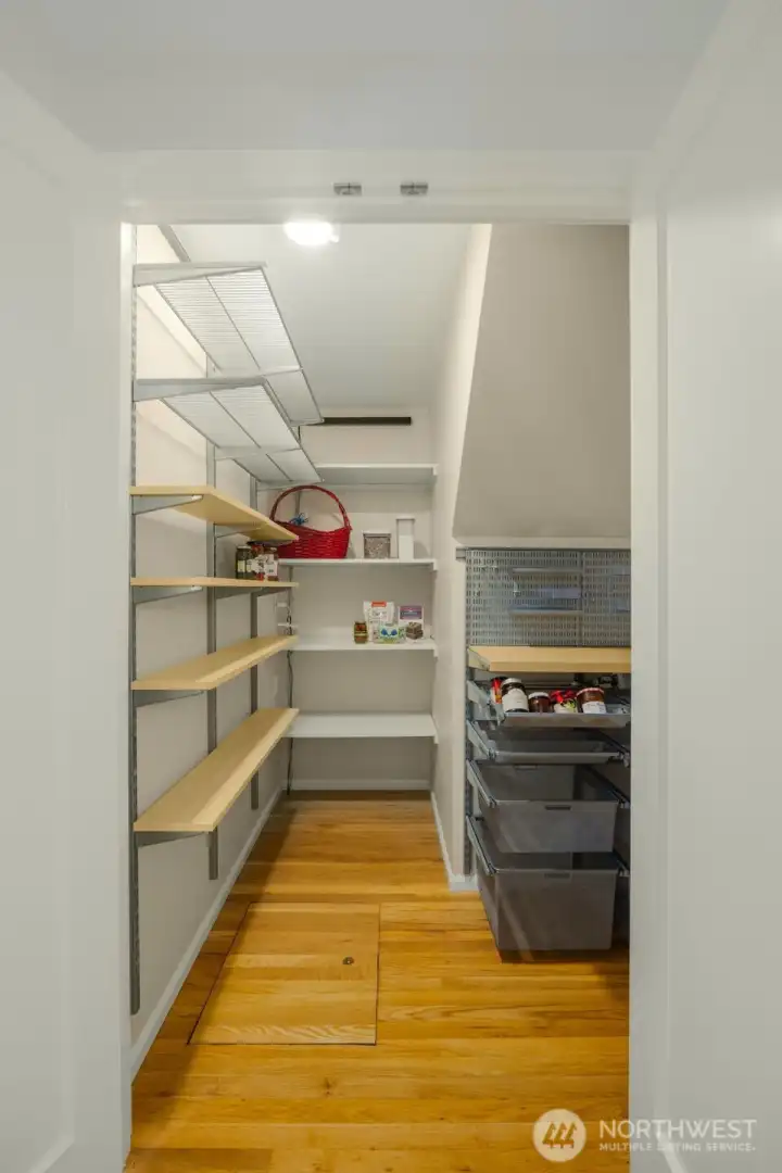 Incredible walk-in pantry! Customized pull out shelves and wired for CAT 6 throughout the house. Incredible walk-in pantry! Customized pull out shelves and wired for CAT 6 throughout the house.