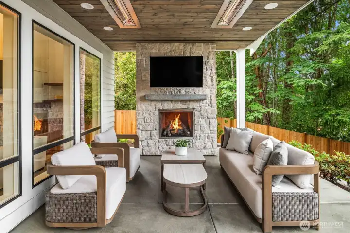 Private outdoor covered living area with fireplace