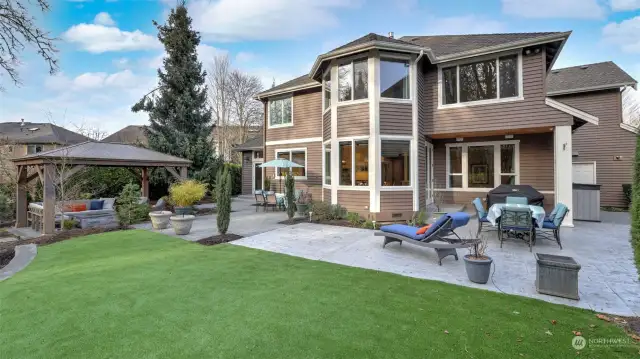 Enjoy the outdoors in this amazing backyard oasis! Artificial turf for ease of care. 100K in upgrades!