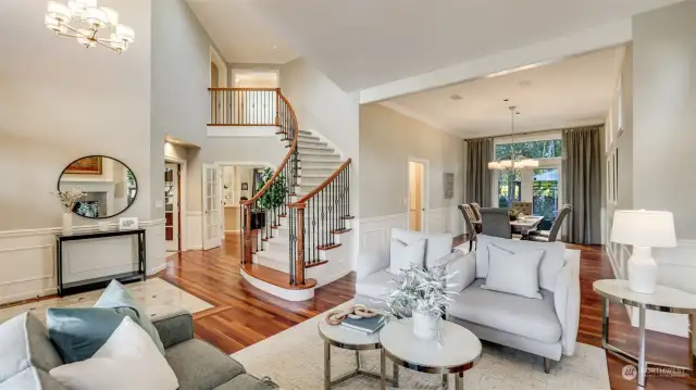 Views through the newly added French doors into the family room & kitchen areas. Den is off entry to the left.