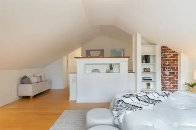 Built-In Bookshelves Flank the Primary Bedroom