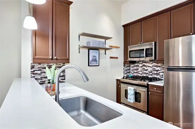 Quartz Counter tops, tiled backsplash