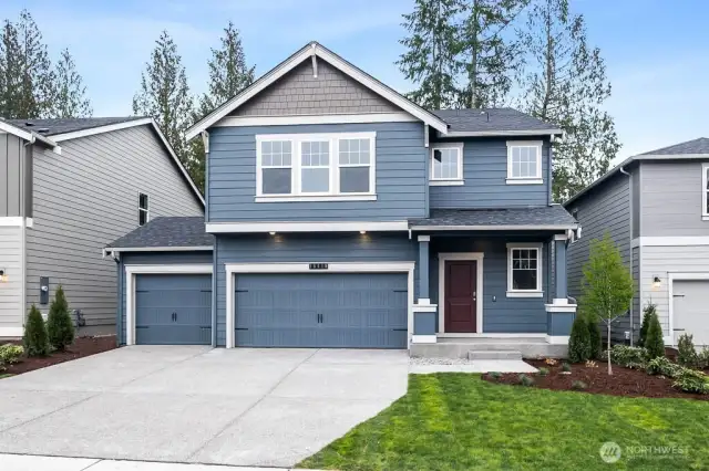 3 car garage, a rare find! Exterior color will be gray, photo is for example only.