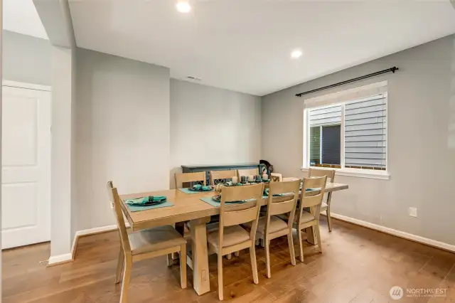 Dining table - room to extend a table.  Photo shows table for 8.
