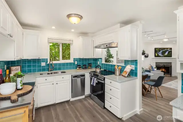 Enjoy new appliances and ample counterspace in handy kitchen