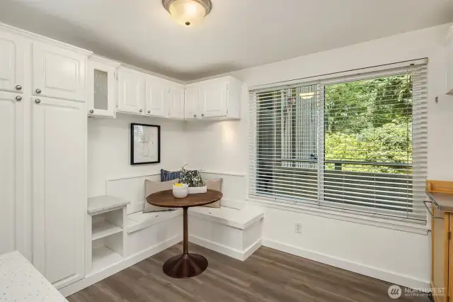 Corner breakfast nook has storage below the seats.