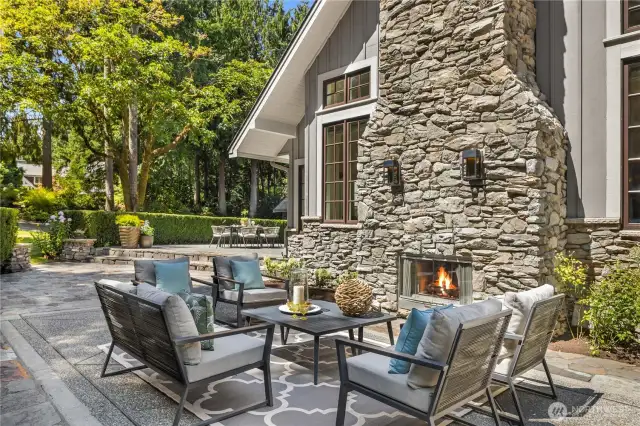 Enjoy relaxing next to the outdoor fireplace
