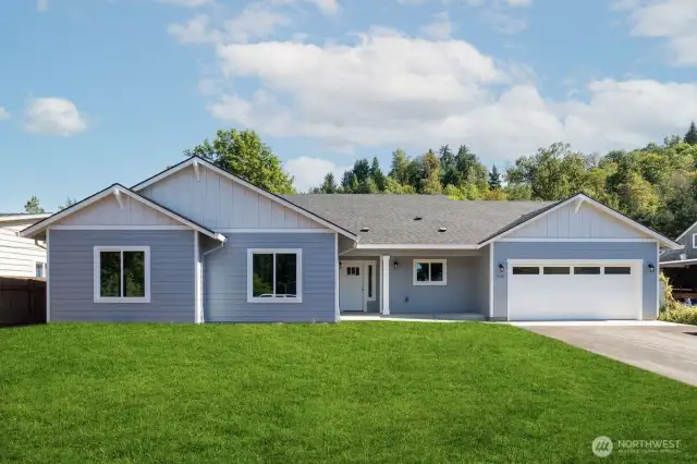 Front of traditional style previously built home