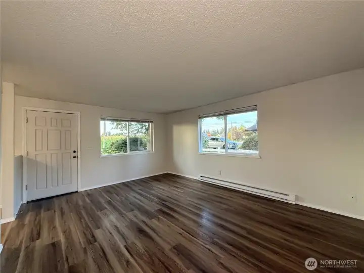 Unit 107 - Open living area with lots of natural light.
