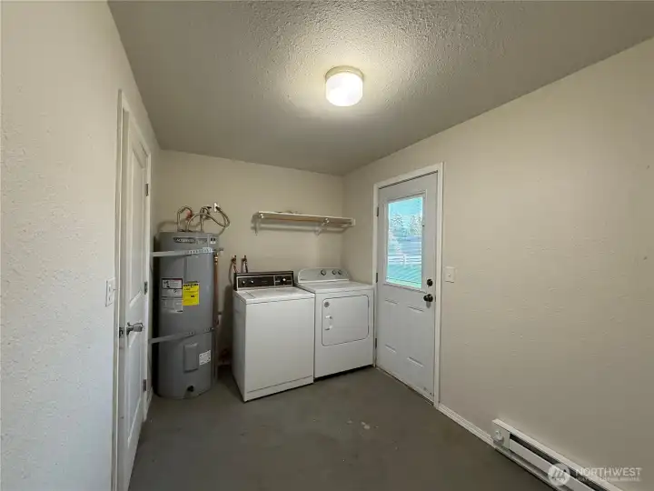 Unit 107 Laundry room new water heater 2021 & New dryer 2024