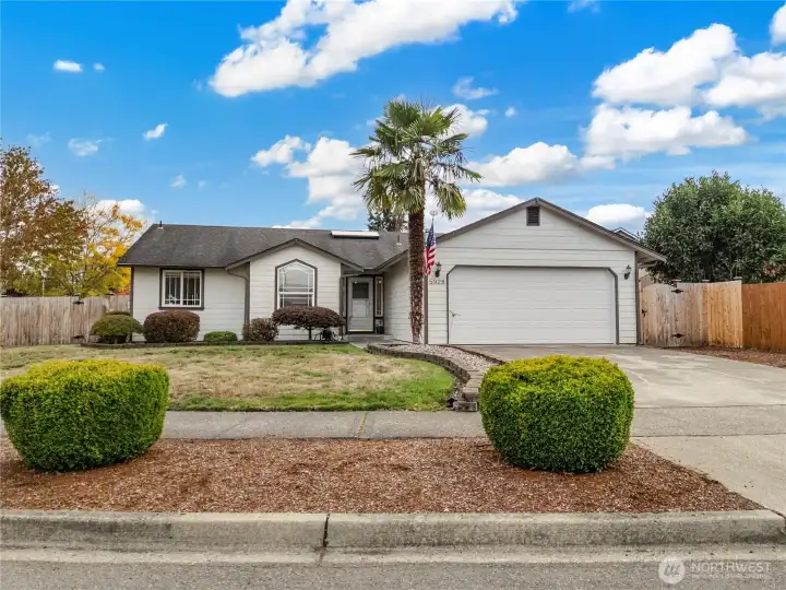 This rambler with open floor plan is located on a large lot with a fully fenced back yard.