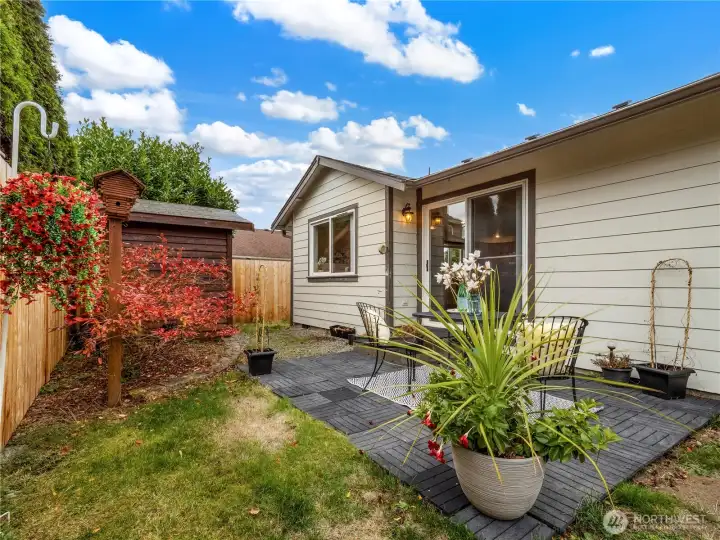 Large sliding doors leads out to your patio where you can have your morning coffee in peace and quiet.
