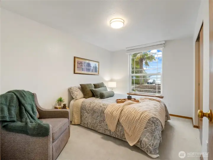 The first bedroom has a large window.