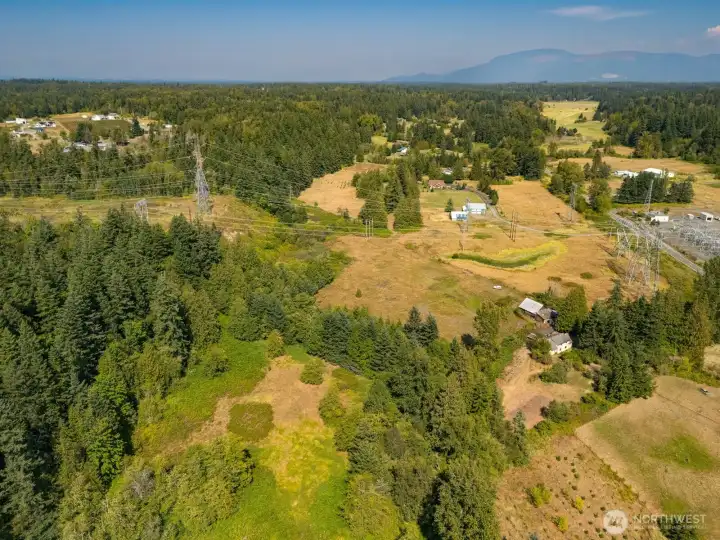 Aerial showing the land on both sides of Squalicum Creek. The creek divides these fields.