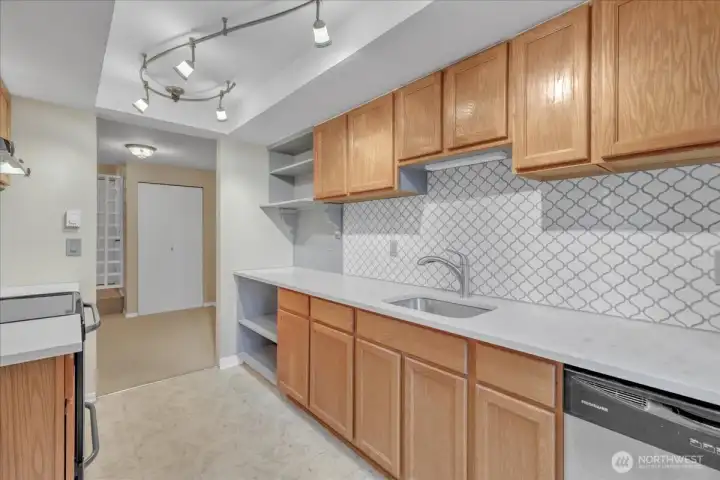 Notice the shelving on right side. Typically refrigerator location as we added to end of cabinets.