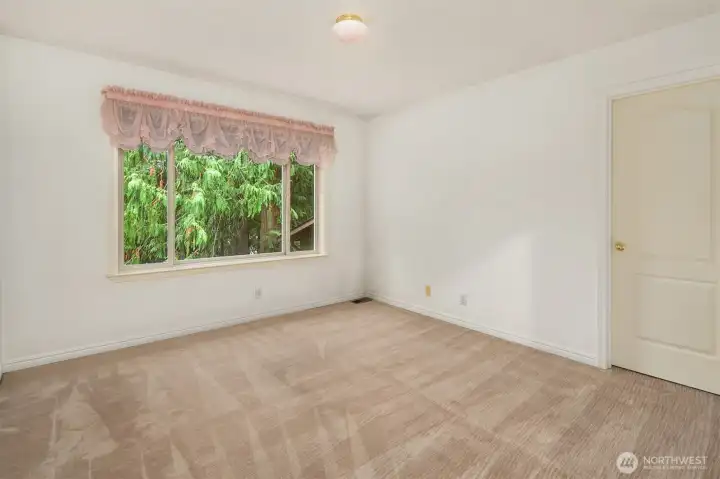 One of two upstairs bedrooms