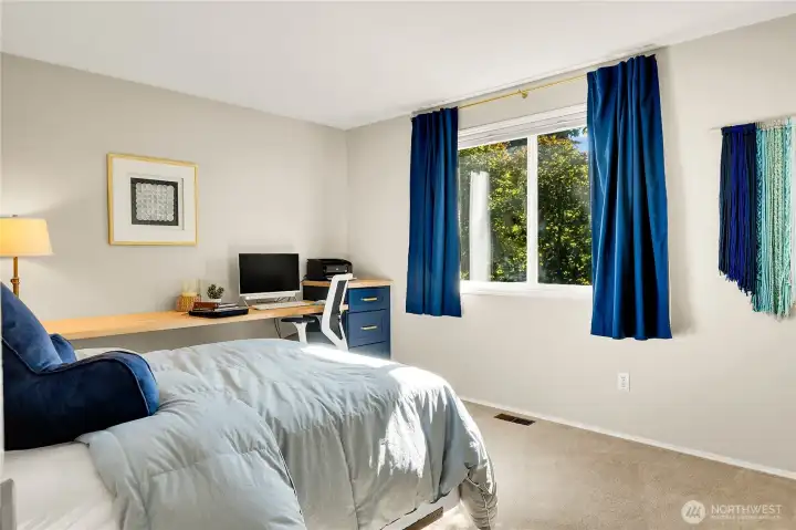 Bedroom #3 with long built-in desk for homework or art projects. Possible 2nd Office....