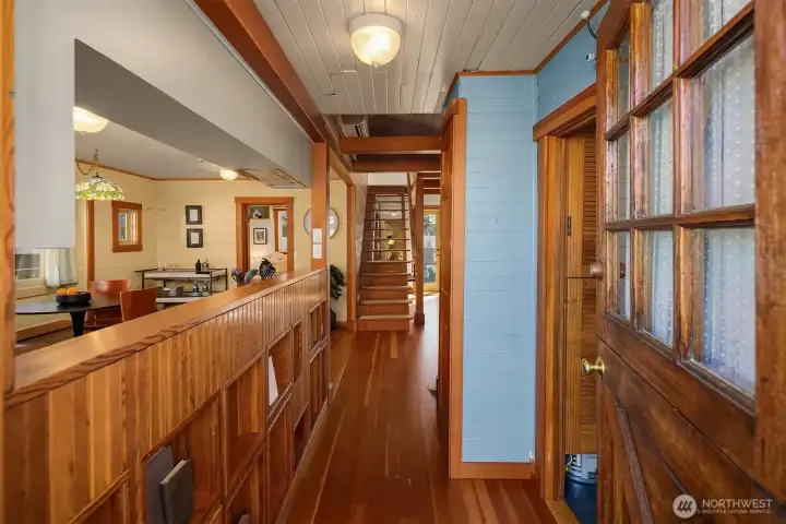Welcome home to this beautifully crafted traditional floating home with its rich wood paneling and friendly dutch-door. Thoughtfully designed nooks provide a place for books or all your extras. Note the stairs, with drawers on the risers, and open as you ascend - Storage and beauty.