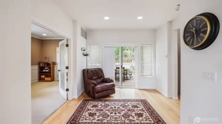 This lower-level space offers a seamless transition to the outdoor patio—perfect for entertaining