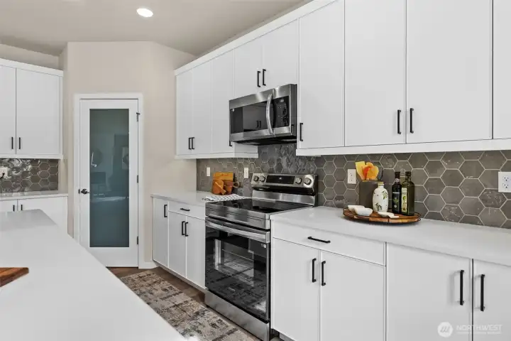 Photos are of a previously built Cedar plan in the community and may display upgrades and or colors that are not available.