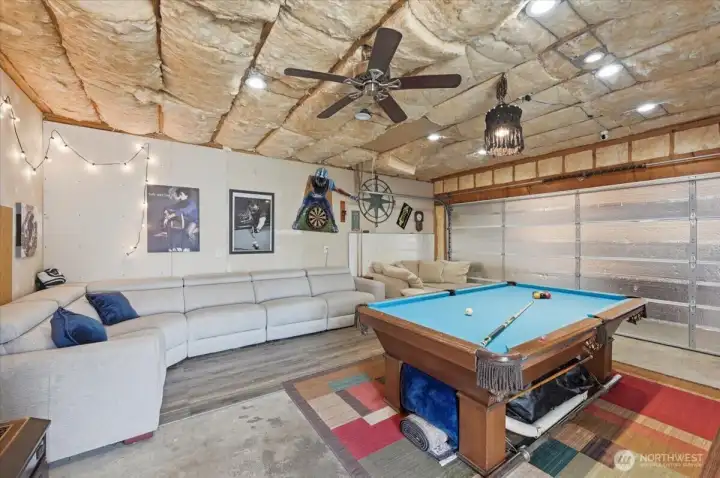 Insulated detached garage with attic storage, wood stove and ready for a mini-split