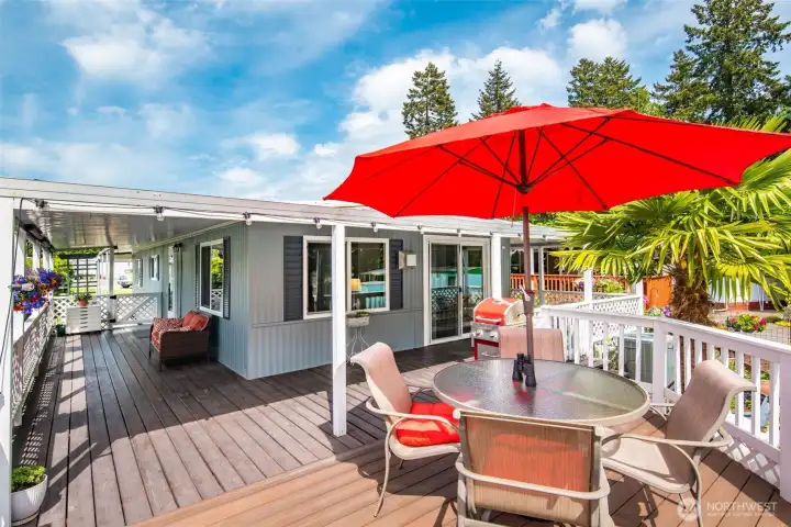 Expansive raised deck creates the perfect outdoor retreat for enjoying Puget Sound views, colorful sunsets & relaxed coastal living. Expansive raised deck creates the perfect outdoor retreat for enjoying Puget Sound views, colorful sunsets & relaxed coastal living.