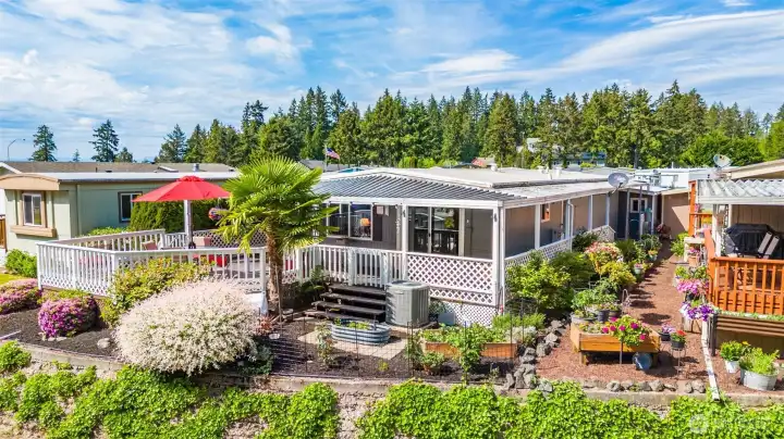 Beautifully updated home nestled in the sought-after Seashore Villa waterfront community surrounded by lush landscaping & towering evergreens. Beautifully updated home nestled in the sought-after Seashore Villa waterfront community surrounded by lush landscaping & towering evergreens.